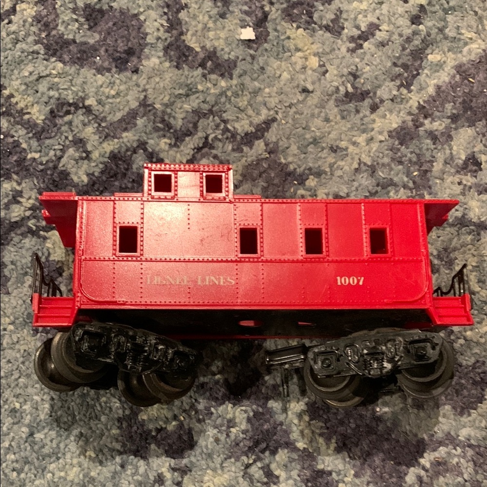 Lionel Lines red plastic caboose w metal wheels